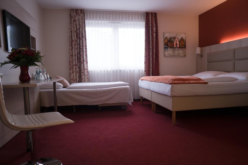Hotel Roedelheimer Hof - Am Wasserturm Frankfurt am Main Quarto foto