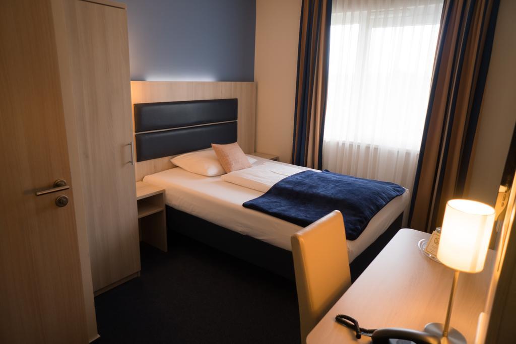 Hotel Roedelheimer Hof - Am Wasserturm Frankfurt am Main Quarto foto